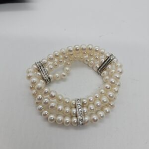 faux pearl stretch bracelet three strands with silver tone rhinestone accents